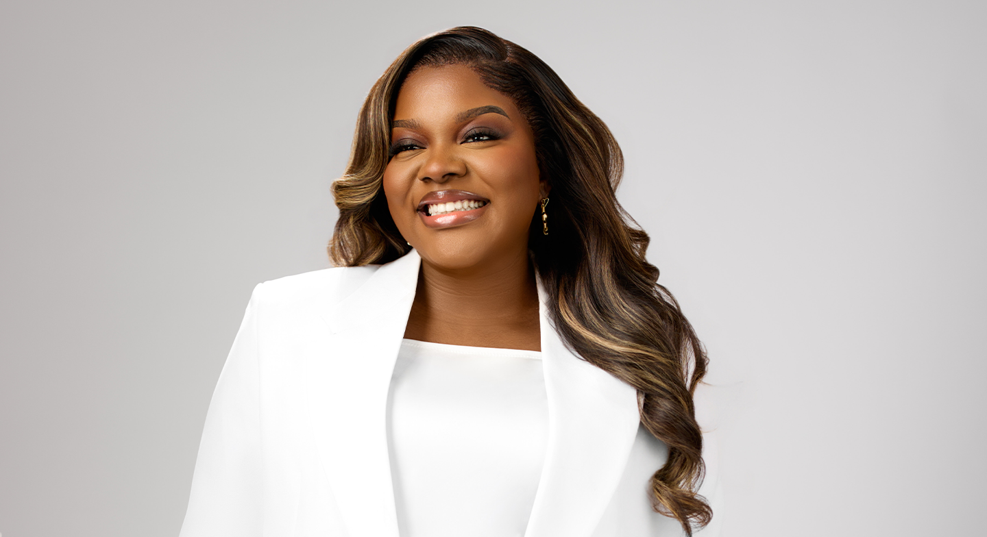 Sunmisola Agbebi-Okeleye in a white blazer